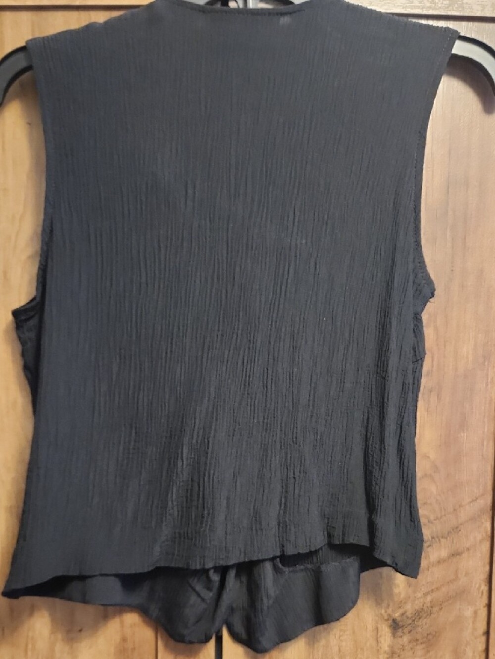 Black Crinkle Sleeveless V-Neck Vest with Decorative Large Unique Swirl Buttons - Picture 6 of 6
